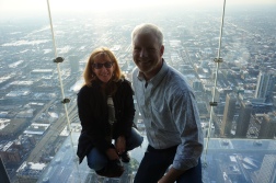 The happy couple 103 stories up with nothing but an inch of glass holding us up